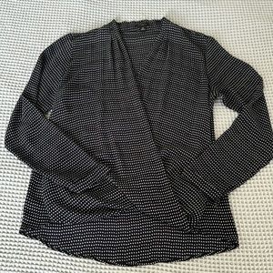 Ann Taylor navy dot wrap long sleeve top, size SP.